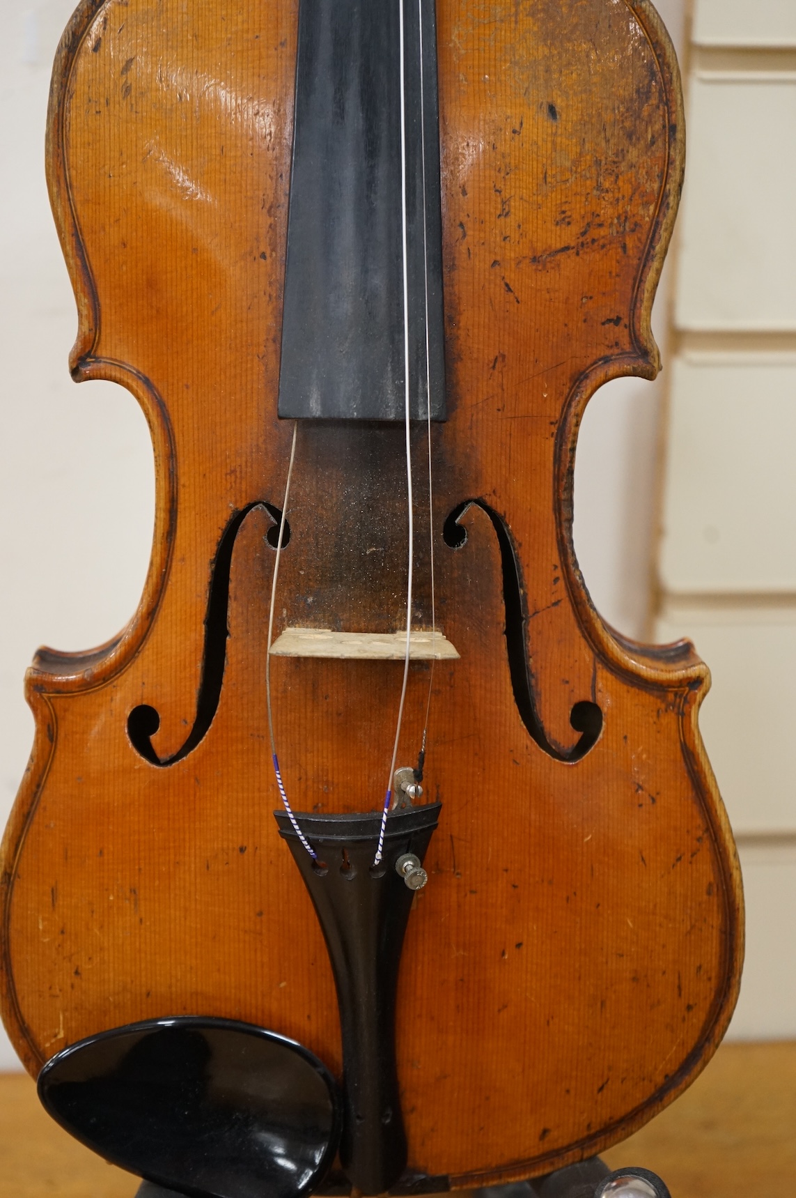 A cased late 19th century violin, Stradivarius copy, with two bows, one fully mounted and signed Roger Lotte, CITES Submission reference, RSF8HBLC